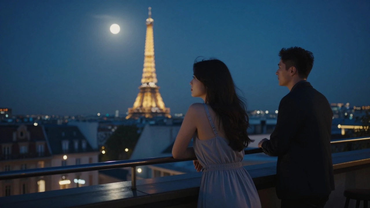 A woman and man stand together on a Paris rooftop at night, gazing at the Eiffel Tower under moonlight.